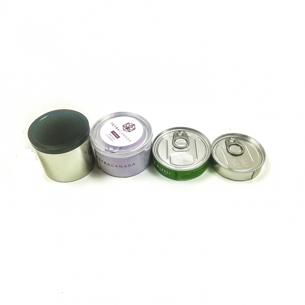 different sizes tinplate pressitin tin cans with labels and stickers