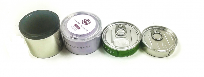 different sizes tinplate pressitin tin cans with labels and stickers